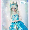 A beautiful ball-jointed doll dressed in a sparkling blue gown and crown, presented against a soft, light background.