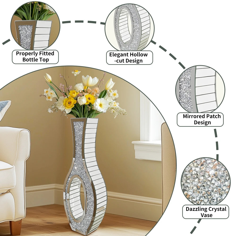 Tall silver mirrored vase with a crushed diamond finish displayed on a wooden floor.