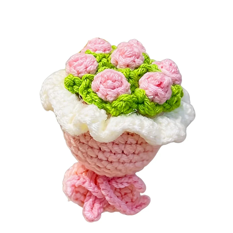 Handmade crochet flower bouquet keychain featuring pink and green flowers