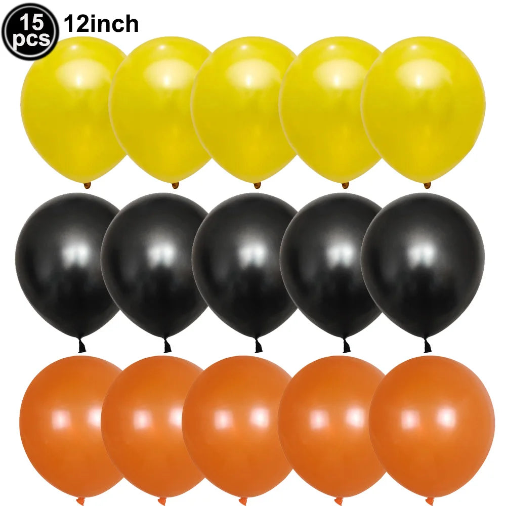 A set of 15 balloons in yellow, black, and orange colors for a construction vehicle themed birthday party.