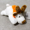 A white plush animal with orange and brown accents, likely a fridge magnet.