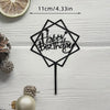 Elegant black and gold acrylic cake topper set with a hexagonal design and happy birthday text