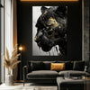 A canvas print of a black panther head with gold abstract splatter art against a dark background.