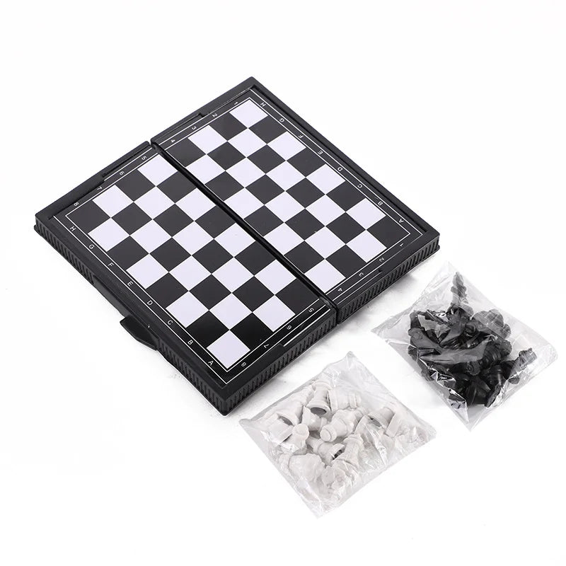 A portable folding magnetic chess set with a black and white checkered board and pieces.