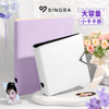 A white A5/A4 ring binder for trading cards and photos displayed next to a purple folder and flowers.