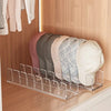 Acrylic cap storage rack displaying several pastel colored caps in a wooden cabinet