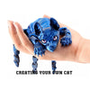 A hand holds a realistic blue Sphynx cat figurine fidget toy.
