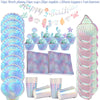 A set of iridescent pink and purple mermaid themed tableware including plates, cups, napkins, toppers, and a banner.