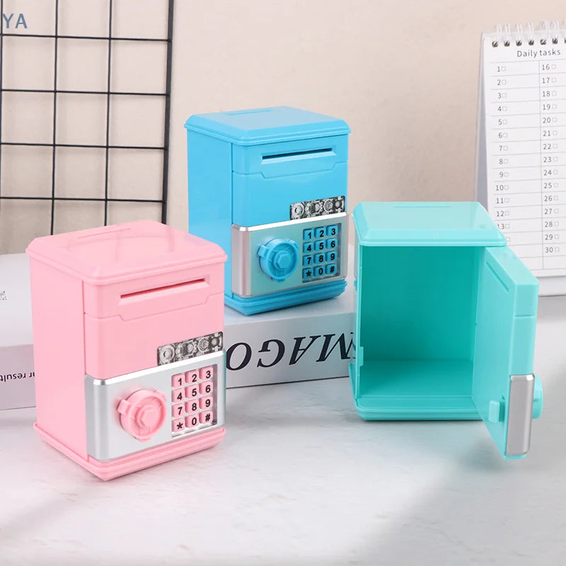 A set of pink and light blue mini piggy banks and money boxes displayed on a white surface.