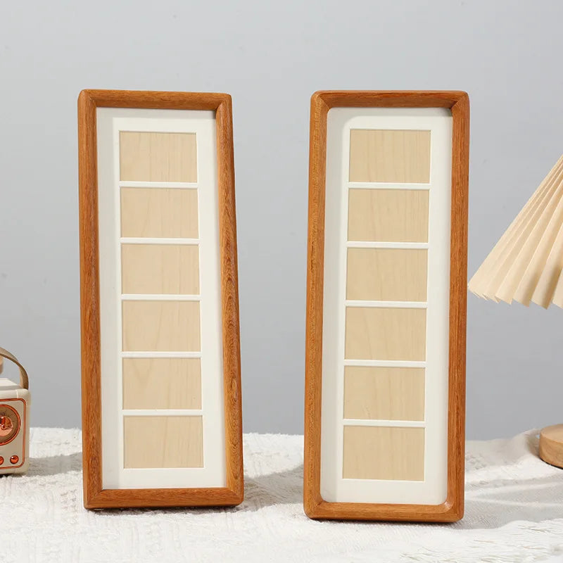 Two vertical solid wood photo frames with light wood panels displayed side by side.