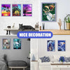 A display of various framed posters featuring nature scenes, including trees, mountains, and wildlife.