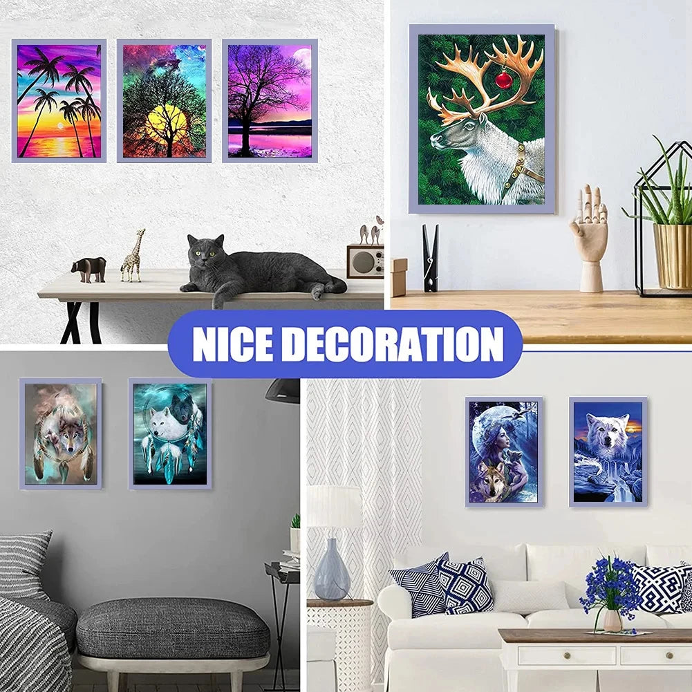 A display of various framed posters featuring nature scenes, including trees, mountains, and wildlife.