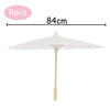 White decorative paper parasol umbrella with a long handle and 8 pieces.