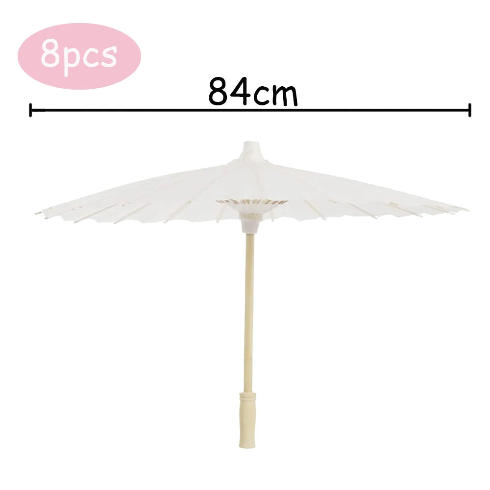 White decorative paper parasol umbrella with a long handle and 8 pieces.