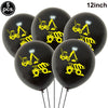 Twelve black foil balloons featuring yellow construction trucks and excavators for party decor