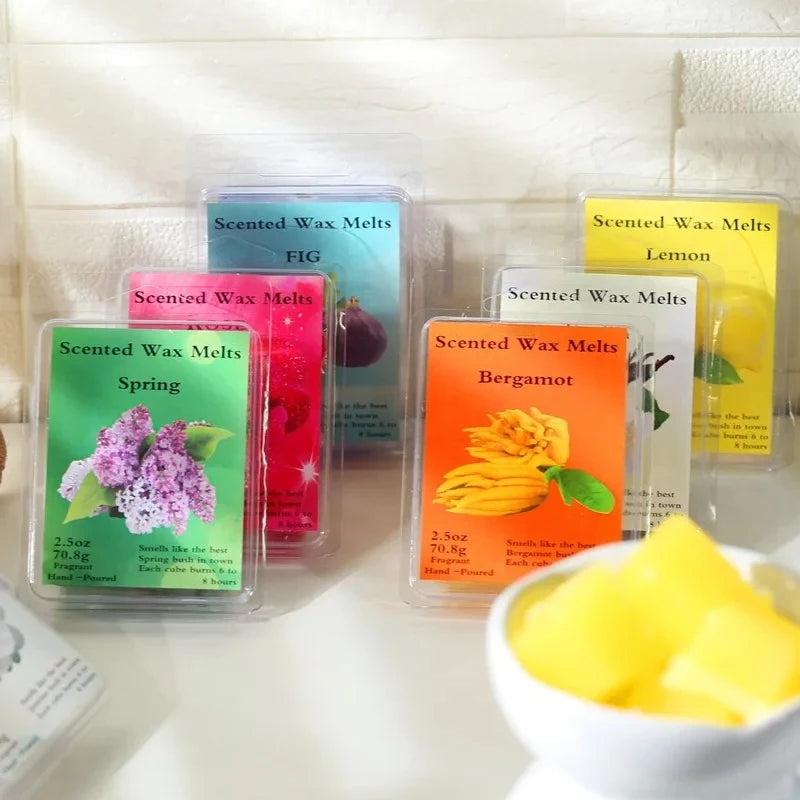 A collection of scented wax melts in various colors including pink, green, and yellow, packaged for DIY candle making.