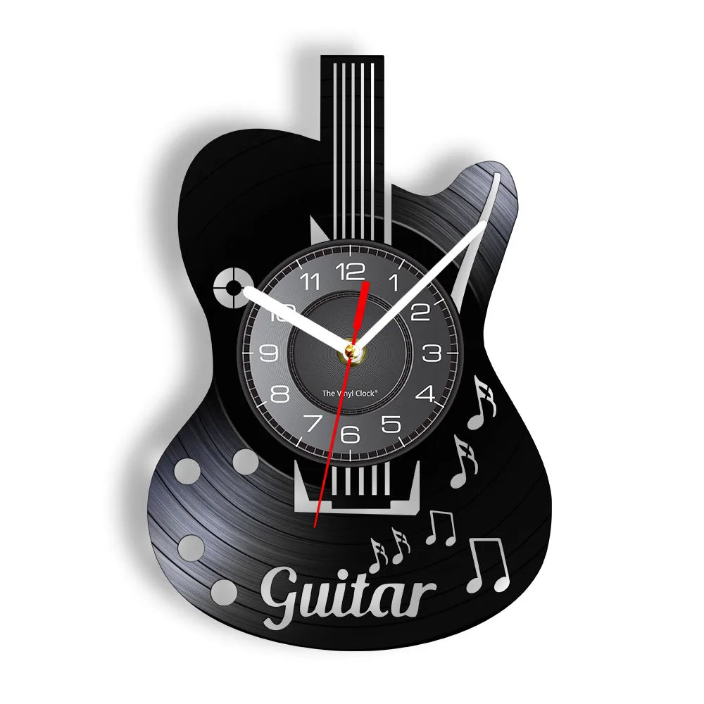 A black vinyl record shaped wall clock featuring a guitar design and a clock face.