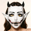A close-up of a white horned fantasy creature mask with detailed facial features worn by a woman.