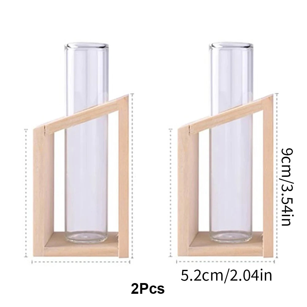 A glass test tube propagation station featuring a clear glass tube held in a wooden frame for plant propagation.