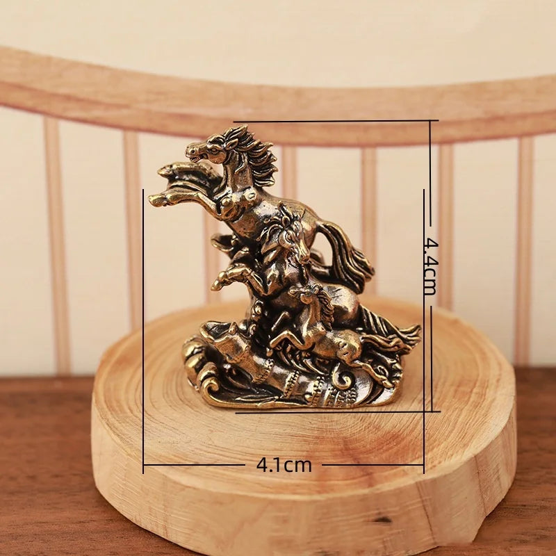 A solid copper horse figurine depicting a rearing horse for prosperity and positive energy.