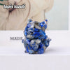 A small blue and white crystal sculpture of a fox head for Feng Shui decor.