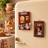A wooden layered puzzle magnet decor featuring a small bakery scene with a squirrel and bread.