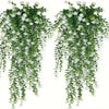 A set of three lifelike faux eucalyptus hanging plants with green leaves and white flowers.