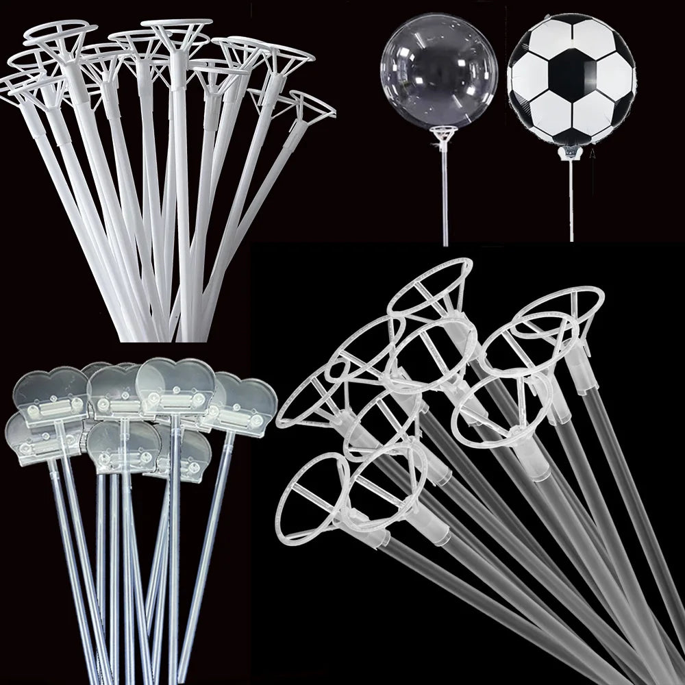 A collection of clear plastic balloon holder sticks and inflatable soccer balls for parties and events.