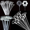 A collection of clear plastic balloon holder sticks and inflatable soccer balls for parties and events.