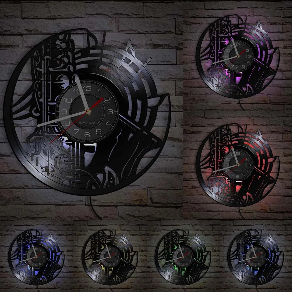 A collection of vintage vinyl record wall clocks featuring intricate designs and glowing accents mounted on a gray brick wall