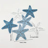 A set of twelve wooden ocean ornaments featuring starfish, shell, and scallop shapes in blue and white.