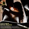 A bride and groom embracing, illuminated by a fiber optic LED glow wand creating a starry sky effect.