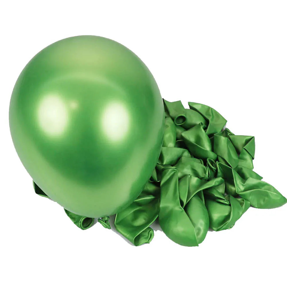 A single, shiny, lime green latex balloon is shown next to a bunch of crumpled green foil balloons.