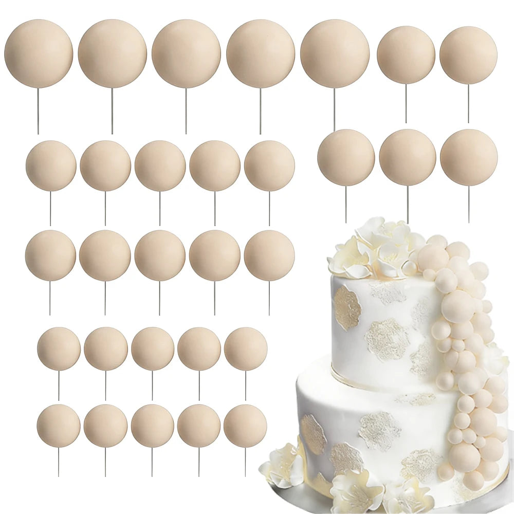 A set of beige foam cake toppers on sticks, including round and petal shapes.