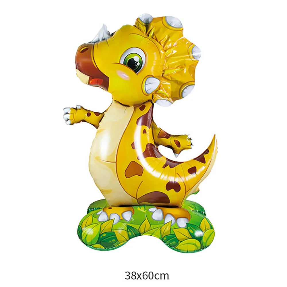 A yellow foil balloon shaped like a lion cub with a green leaf base.