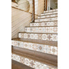 A close-up view of a staircase featuring decorative tile wall stickers on the risers and treads.