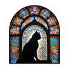 Stained glass window depicting a black cat silhouette against a colorful, intricate floral background.