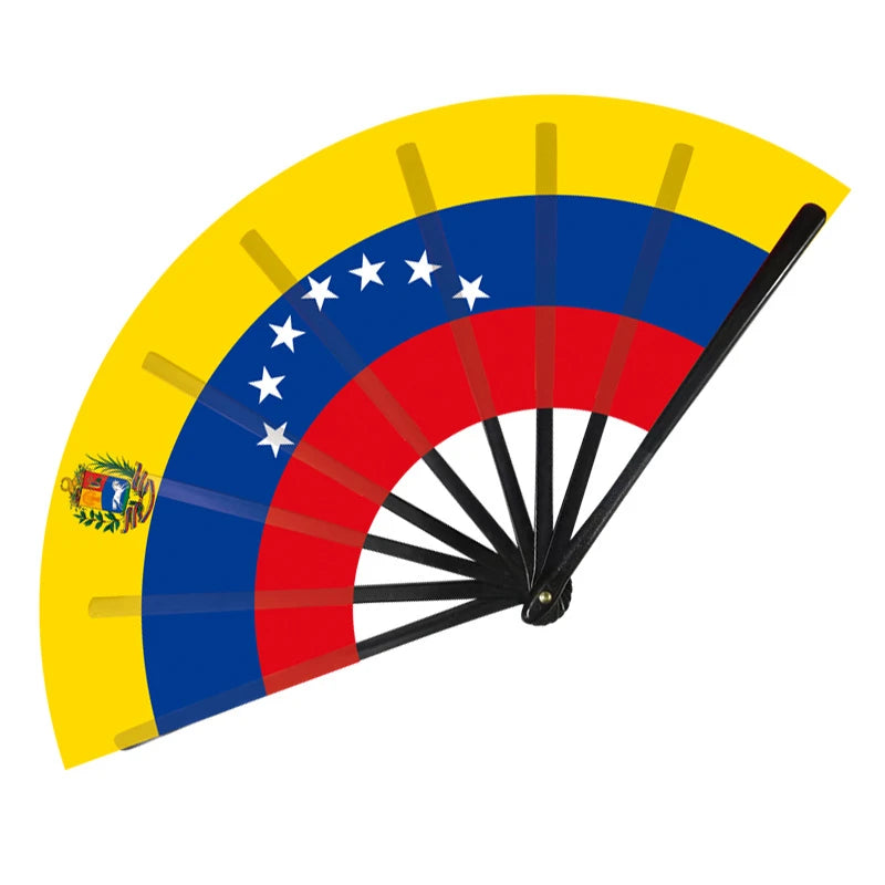 A folding cheering fan with a yellow and blue design featuring stars and a flag motif.
