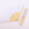 A light wood bamboo folding fan with white paper blades shown open and closed.