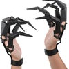 A person wearing black articulated skeleton hand gloves.