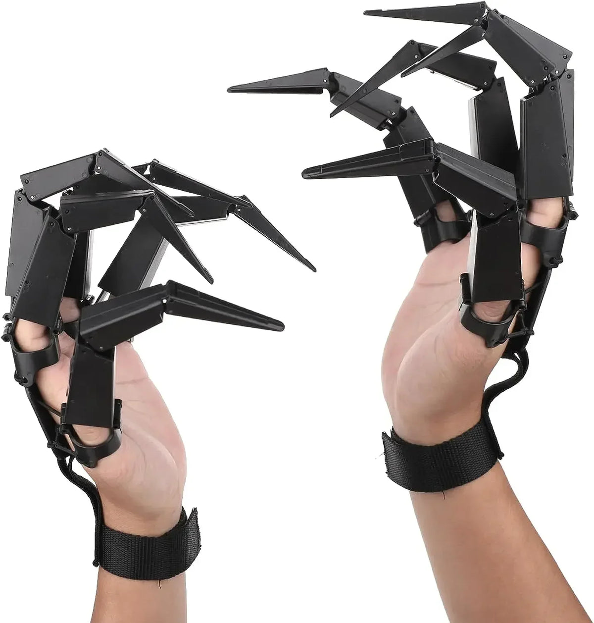 A person wearing black articulated skeleton hand gloves.