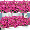 A dense bouquet of vibrant pink silk artificial flowers arranged for home and event decor.