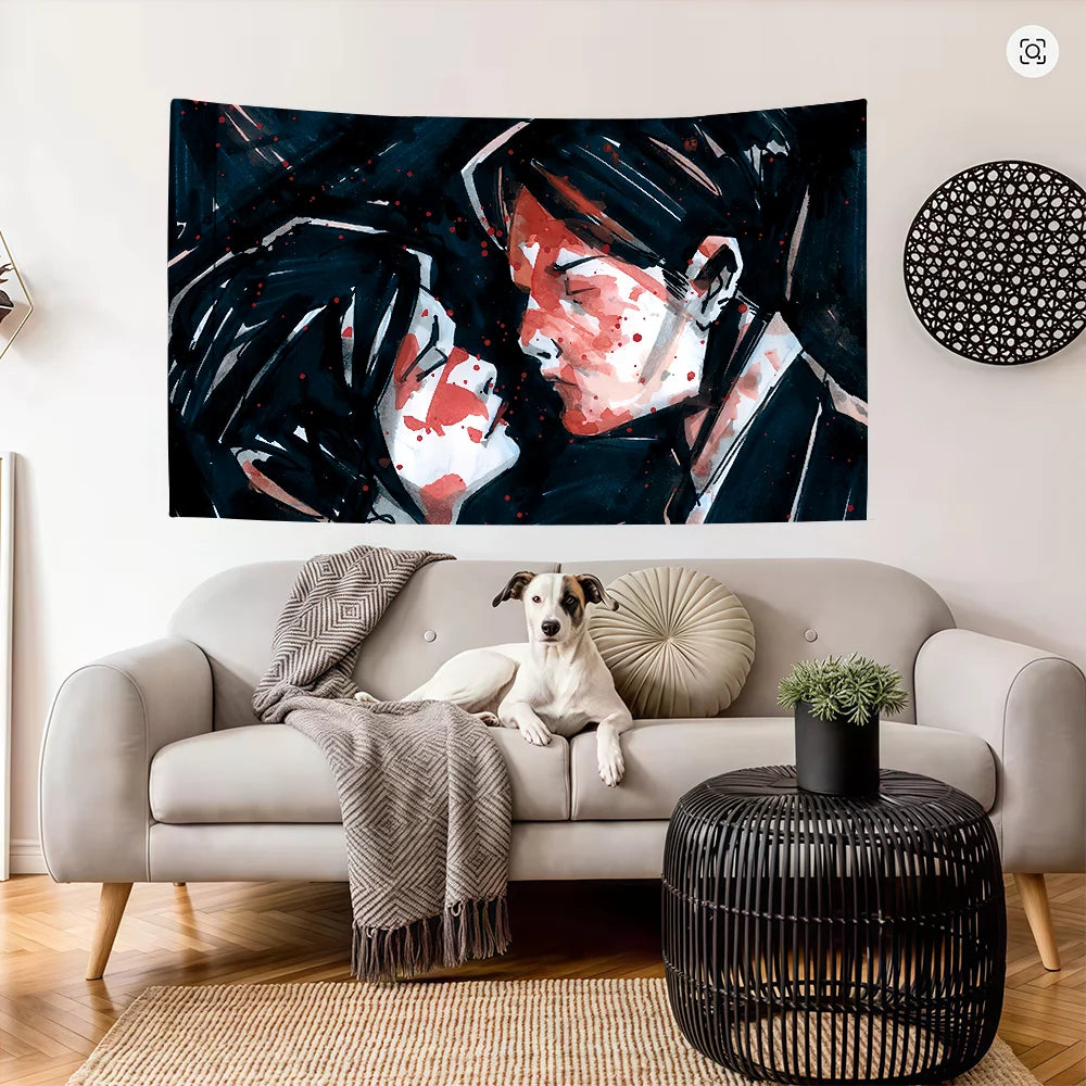 A dark painting featuring a close-up of a face with red markings and black hair, displayed above a light sofa.