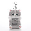 A gray cat keychain featuring a multi-character Kpop photocards holder.