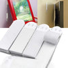 White reusable double-sided adhesive picture hanging strips shown in various forms and applications.