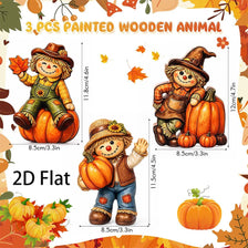 A set of three painted wooden animal figures, including a scarecrow and pumpkins, for autumn decor.