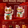 Gift-ready display of a white lucky cat desk ornament with gold-rimmed glasses and a green collar.