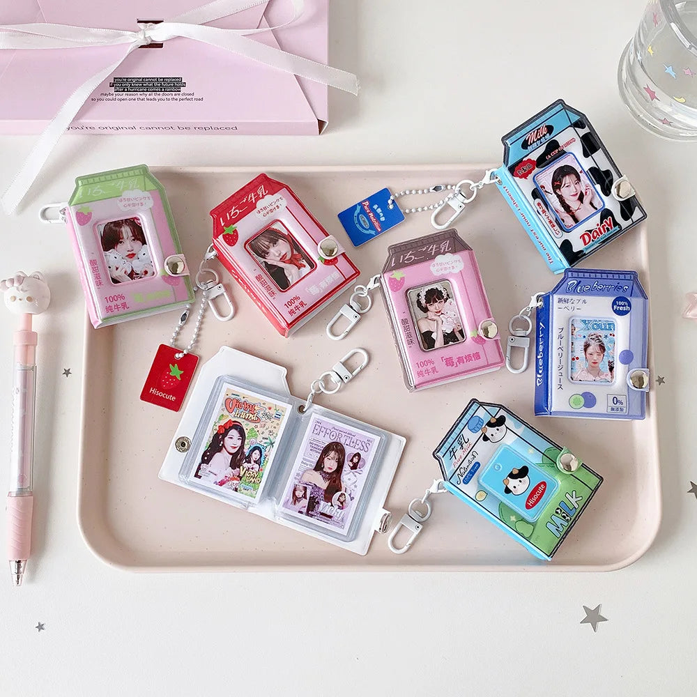 A collection of photo keychains featuring cartoon milk bottle designs in various colors and packaging.