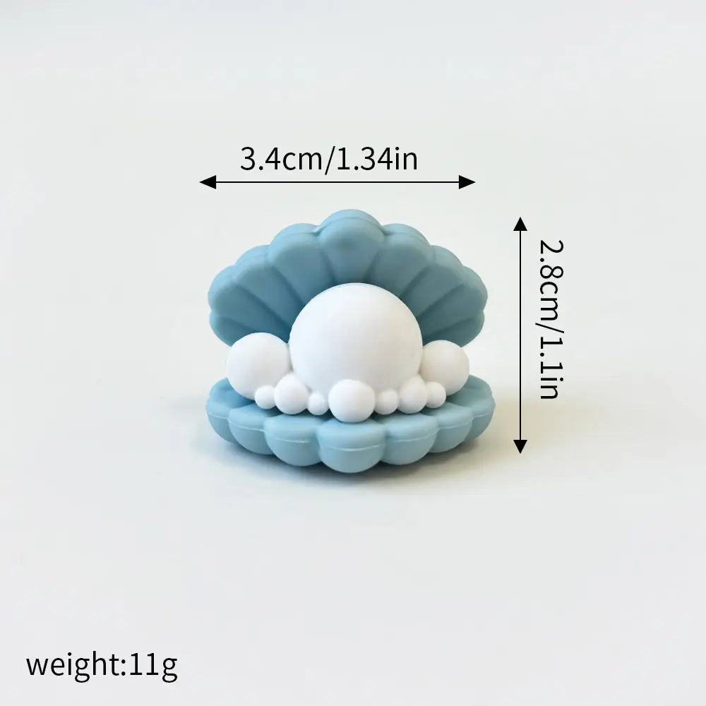 A set of three light blue ocean animal cake toppers, including a whale, octopus, and turtle, displayed on a white background.