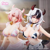 A pair of adorable cow-girl miniature figures, one pink-haired and one white-haired, posed together.